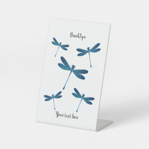 Dragonfly cartoon illustration pedestal sign