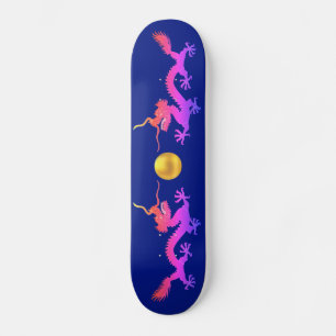Dragons in pink, red and blue shades on blue skateboard
