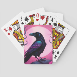 Drawing of a raven on neon pink background playing cards