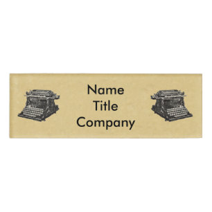 Drawing of black Old Time Typewriters on Tan Name Tag