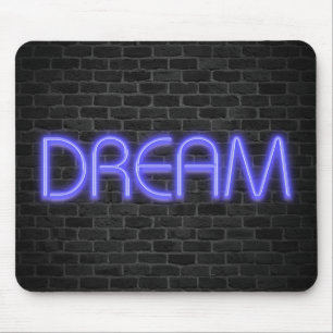 DREAM text in neon lights on brick Mouse Pad
