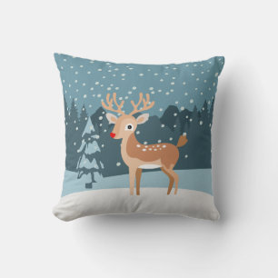 Dreamy winter landscape with a cute deer cushion