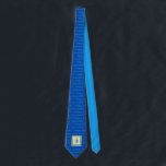 Dreidel, Dreidel, Dreidel! Hanukkah Tie<br><div class="desc">Celebrate the holidays with family and friends wearing this blue and yellow Dreidel,  Dreidel,  Dreidel! Hanukkah Tie. Its contemporary dreidel graphic is set upon a repeat pattern of "Happy Hanukkah." Also makes a great Hanukkah gift.</div>