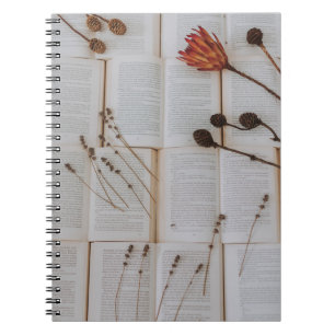 Dried flowers on books