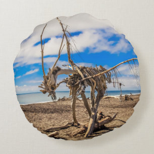 Driftwood artwork on Hokitika Beach, New Zealand Round Cushion