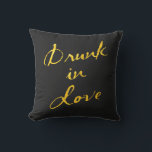 Drunk in Love Gold & Black Outdoor Pillow<br><div class="desc">This fun and flirty outdoor pillow is accented with the saying "Drunk in Love" in a bold gold brush stoke on a black background,  making it the perfect accessory for the couple's table at an outdoor wedding,  or the newlywed's deck,  patio or porch.</div>