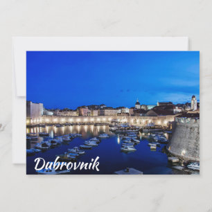 Dubrovnik harbor and walls illuminated at night