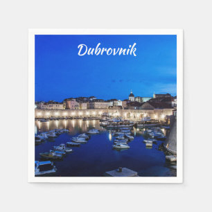 Dubrovnik harbor and walls illuminated at night napkin