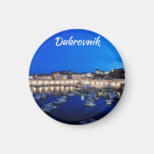 Dubrovnik harbour and walls illuminated at night magnet