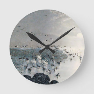 Ducks, Mallards and Swans on the lake at sunset Round Clock