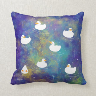 ducks swimming in space cushion