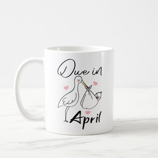 Due In April Cute Swan Carrying A Funny New Baby Coffee Mug (Left)