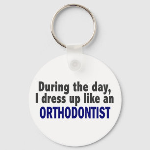 During The Day I Dress Up Like An Orthodontist Key Ring