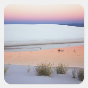 Dusk sky reflected in pool of water from square sticker