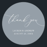 Dusty Blue Grey Minimalist Wedding Thank You Classic Round Sticker<br><div class="desc">Our modern minimalist thank you sticker/seal has "thank you" written in modern calligraphy script and can be fully customised with your name,  dates and background colour. Made to match our Purple Plum Modern Minimalist Wedding Suite.</div>