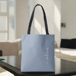 Dusty Blue Minimalist Modern Monogram Elegant Tote Bag<br><div class="desc">Introducing our Dusty Blue Minimalist Modern Monogram Elegant Collection: Elevate your style with understated sophistication and timeless charm. Our collection features minimalist designs in a soothing dusty blue hue, enhanced with elegant monograms tailored to your personal taste. From refined stationery to versatile accessories, each piece in our collection is meticulously...</div>