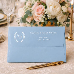Dusty blue monogram wreath return address envelope