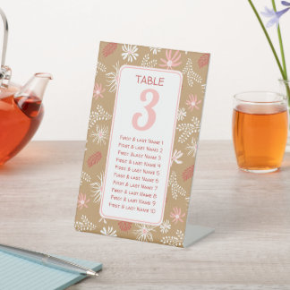 Dusty pink floral seating chart table # pedestal sign