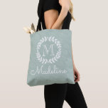 Dusty Sage Green Botanical Wreath Elegant Monogram Tote Bag<br><div class="desc">Carry your things in style with this personalised mint green and white monogrammed tote bag.Name and initial can be different on front and back. All text is simple to customise. Design features modern laurel wreath and leaves, stylish typography initial, and hand written style script calligraphy name. Makes an elegant and...</div>