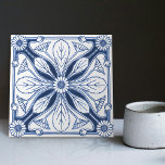 Dutch Delft Blue Daisy Repro Backsplash Kitchen Ceramic Tile<br><div class="desc">This ceramic tile from the Dutch Delft Blue tradition is a stunning example of artistry and craftsmanship. The tile features a symmetrical floral daisy theme, with a central flower surrounded by smaller leaves. The tile is glazed in the traditional Delft Blue and white colour scheme. Perfect for adding a touch...</div>