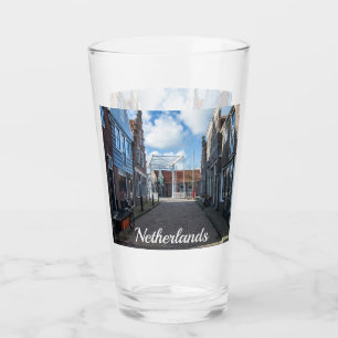 Dutch village with traditional wooden bridge glass