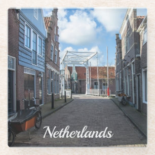 Dutch village with traditional wooden bridge glass coaster