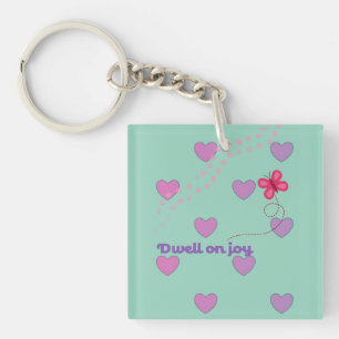 dwell on joy hearts and paw prints button key ring