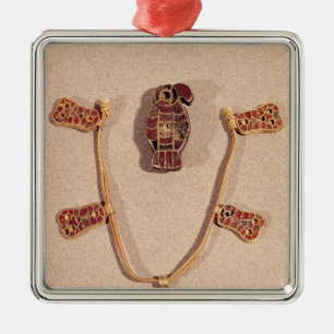 Eagle-shaped brooch and a necklace metal ornament