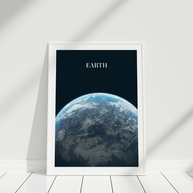 Earth from Space Poster (Earth from Space Poster in white frame on wooden floor.)