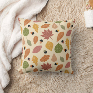 Earth Tone Autumn leaves with acrons on beige  Cushion