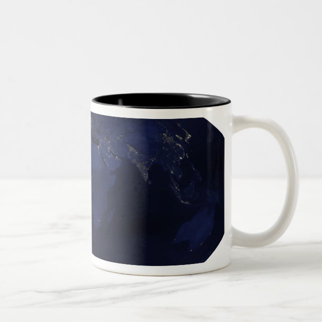 EarthÃ¯Â¿Â½s human-generated nighttime lights Two-Tone Coffee Mug (Right)