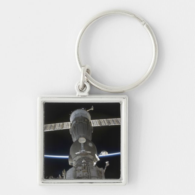Earth's limb intersects a Soyuz spacecraft Key Ring (Front)