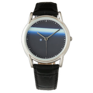 Earth's Thin Line Of Atmosphere And A Gibbous Moon Watch