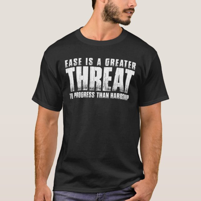 EASE IS A GREATER THREAT TO PROGRESS THAN HARDSHIP T-Shirt (Front)