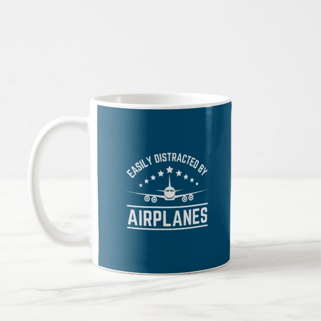 easily distracted by aeroplanes coffee mug (Left)