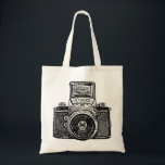 East German Camera - Black Tote Bag<br><div class="desc">A bag with a high contrast,  high passed filtered and vectorised image of a vintage East German camera from the 1950s. Creating a strong bold toothy retro screen print. or mediaeval Gothic brass rubbing like effect.</div>