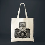 East German Camera - Black Tote Bag<br><div class="desc">A bag with a high contrast,  high passed filtered and vectorised image of a vintage East German camera from the 1950s. Creating a strong bold toothy retro screen print. or mediaeval Gothic brass rubbing like effect.</div>