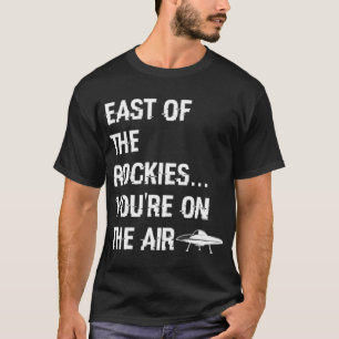 East of the Rockies  Art Bell Saying    T-Shirt