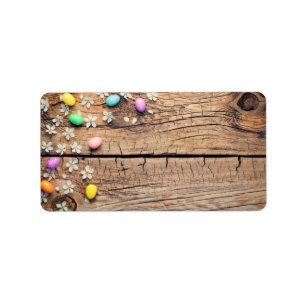 Easter Background with Blossom and Eggs on Wood Label