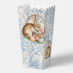 Easter, bunnies, and colorful eggs in a wicker bas favour box