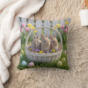 Easter Bunnies In a Wicker Basket on Grass Cushion