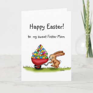 Easter Bunny moves coloured eggs in wheelbarrow Holiday Card