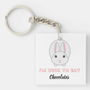 Easter bunny waiting to eat chocolates key ring