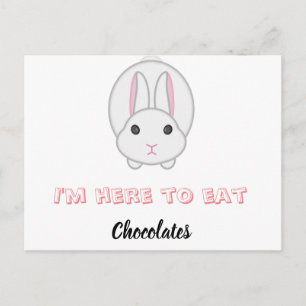 Easter bunny waiting to eat chocolates postcard