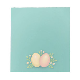 Easter eggs among flowers and leaves colourful notepad