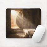 Easter Empty Tomb with Shroud Mouse Pad<br><div class="desc">Sun rays illuminate a stone tomb through an open entrance,  casting dramatic shadows on a draped cloth resting on a stone slab that hints at a significant absence</div>