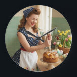 Easter Pin-Up Girl Vintage Retro Kitchen Wall Cloc Large Clock<br><div class="desc">Add a touch of vintage 1950s glamour to your home with this stylish Easter Pin-Up wall clock! Part of our exclusive Easter Retro Collection, this delightful scene features a lovely girl decorating a traditional Easter cake in a sunny mint kitchen. It’s a perfect functional decor piece for any baking enthusiast,...</div>