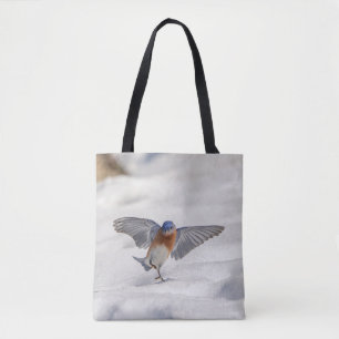 Eastern Bluebird dancing in the snow Tote Bag