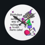 Eat More Cake Birthday Humour Round Clock<br><div class="desc">Birthdays are nature's way of telling us to eat more cake! Stella in a birthday hat with a cake on humourous birthday T-shirt,  birthday buttons,  cards,  stickers,  magnets,  keychains,  mugs,  tote bags,  ornaments,  and other funny birthday items.</div>