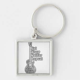 Eat sleep guitar repeat. rerto black and white key ring